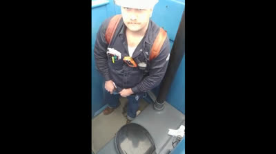 Bearded Hunk Strokes Cock Outdoors in a Porty Potty