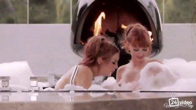 Two redheads in the bath