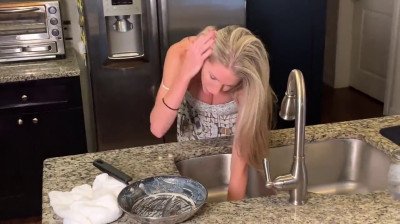 Housewife stuck in the sink