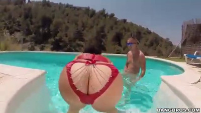 Sexy slut messing around in a swimming pool