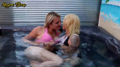 Two Dutch girls enjoying themselves in a Jacuzzi