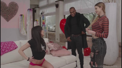 Interracial threesome with two tattooed rocker girls